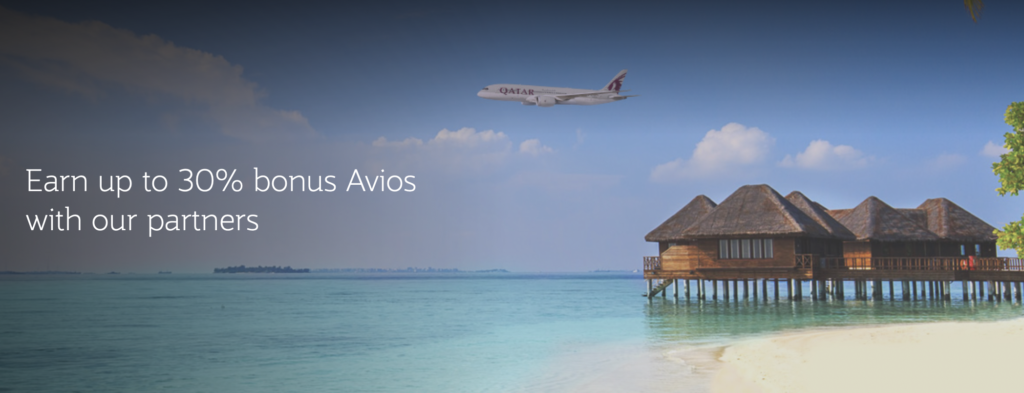 a plane flying over a beach